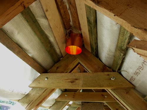 Safety of thatched roofs through construction protection in the Sepatec system. Here is the view from the inside and the ventilation element