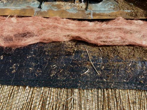 The insert with copper fiber that protects the entire thatch beneath, before the rapid growth of moss