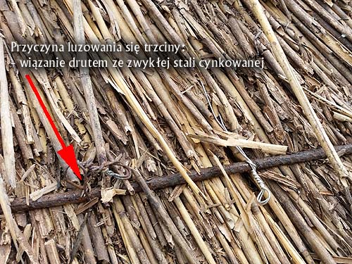 Thatch, roof made of reeds: intentional stonework bug, i.e. using a galvanized wire instead of a chrome-nickel