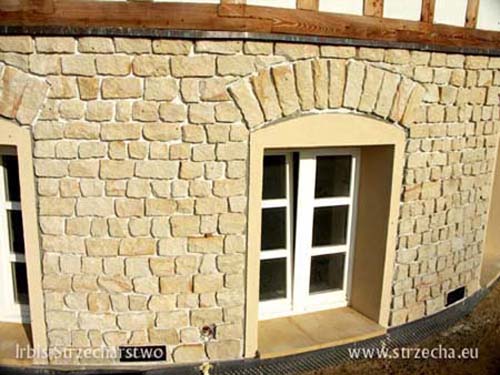 Thatch roof: the sandstone facade of the Irbis company